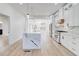 Gourmet kitchen with white cabinetry, stainless steel appliances, and waterfall island at 1456 S Gordon Sw St, Atlanta, GA 30310