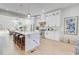 Bright, modern kitchen with a marble-topped island, stainless steel appliances, and white cabinetry at 1456 S Gordon Sw St, Atlanta, GA 30310