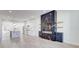 Bright open-concept living area showcasing island kitchen and statement wall decor at 1456 S Gordon Sw St, Atlanta, GA 30310