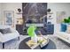 Bright living room featuring a modern fireplace, stylish decor, and comfortable seating at 1456 S Gordon Sw St, Atlanta, GA 30310