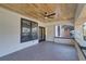 Inviting covered porch with a wood ceiling, tile floor, and black-framed windows offering a relaxing outdoor space at 1456 S Gordon Sw St, Atlanta, GA 30310