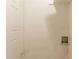 A simple laundry room featuring plumbing hookups and a white painted door at 2877 Kensington Way, Rex, GA 30273