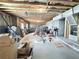 Unfinished basement with exposed ceiling and framing and concrete floor offers an opportunity to add living space at 404 After Glow Smt, Canton, GA 30114