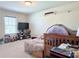 Cozy bedroom with a large window, carpet, a twin bed, and built-ins that are perfect for a  at 404 After Glow Smt, Canton, GA 30114