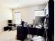 Spacious bedroom with a desk by the window, neutral carpet and overhead lighting at 404 After Glow Smt, Canton, GA 30114
