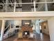 Spacious clubhouse interior featuring high ceilings, a stone fireplace, and an open floor plan at 404 After Glow Smt, Canton, GA 30114