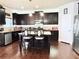 Charming kitchen features stainless steel appliances and granite countertops with a center island at 404 After Glow Smt, Canton, GA 30114