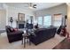 Spacious living room with a stone fireplace, ceiling fan and lots of natural light at 404 After Glow Smt, Canton, GA 30114