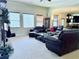 Spacious living room with plush seating, a fireplace, and ample natural light at 404 After Glow Smt, Canton, GA 30114