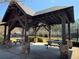 Community pavilion with stone pillars and picnic tables creates a perfect spot for outdoor gatherings at 404 After Glow Smt, Canton, GA 30114