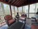 Relax in a screened porch with wicker furniture to get away from the elements and enjoy the outdoors at 404 After Glow Smt, Canton, GA 30114
