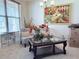 Cozy sitting room with stylish decor, a decorative table, and natural light from the window at 404 After Glow Smt, Canton, GA 30114