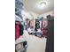 Expansive walk-in closet with ample shelving and storage for organizing clothing and accessories at 404 After Glow Smt, Canton, GA 30114