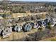 An aerial view of a residential neighborhood near a golf course and lake at 5325 Davenport Mnr, Cumming, GA 30041