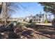 A large backyard offering ample space for outdoor activities and gardening at 5325 Davenport Mnr, Cumming, GA 30041
