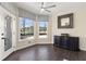 Charming breakfast nook featuring hardwood floors and a decorative cabinet at 5325 Davenport Mnr, Cumming, GA 30041