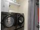 Convenient laundry room equipped with modern washer and dryer units at 5325 Davenport Mnr, Cumming, GA 30041