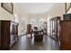 Bright office offers hardwood floors, beautiful windows, and lots of storage at 5325 Davenport Mnr, Cumming, GA 30041