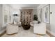 Stylish living room with hardwood floors, neutral decor, and plenty of seating at 1004 Windermere Xing, Cumming, GA 30041