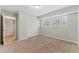 Bright bedroom with a double door closet and natural light at 135 S Falcon Blf, Alpharetta, GA 30022
