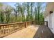 The home features an inviting back deck overlooking a private, wooded backyard at 1596 Willowbrook Sw Dr, Atlanta, GA 30311