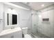 Renovated bathroom featuring new tiling, new shower, and granite countertops at 1596 Willowbrook Sw Dr, Atlanta, GA 30311