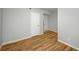 Neutral bedroom featuring hardwood floors and white doors at 1596 Willowbrook Sw Dr, Atlanta, GA 30311