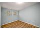 Small bedroom featuring hardwood floors and natural light at 1596 Willowbrook Sw Dr, Atlanta, GA 30311