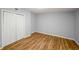 Bedroom featuring closet and hardwood floors at 1596 Willowbrook Sw Dr, Atlanta, GA 30311