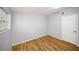 Bedroom with hardwood floors and a window at 1596 Willowbrook Sw Dr, Atlanta, GA 30311