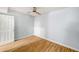 This bedroom offers luxury vinyl floors, new ceiling fan, and spacious closet at 1596 Willowbrook Sw Dr, Atlanta, GA 30311