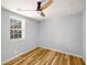 Bright bedroom with luxury vinyl floors, new ceiling fan, and ample natural light at 1596 Willowbrook Sw Dr, Atlanta, GA 30311