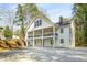 Charming two-story home with covered porch, and an external staircase, perfect for enjoying the outdoors at 1596 Willowbrook Sw Dr, Atlanta, GA 30311
