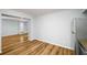 Bright kitchen and dining area with hardwood floors and stainless steel refrigerator at 1596 Willowbrook Sw Dr, Atlanta, GA 30311