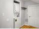 Convenient laundry room with stacked washer and dryer units at 1596 Willowbrook Sw Dr, Atlanta, GA 30311