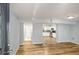 Bright living space features beautiful hardwood floors and easy access to the adjacent kitchen area at 1596 Willowbrook Sw Dr, Atlanta, GA 30311