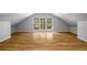 Bright living room with wood floors, vaulted ceilings, and large windows at 1596 Willowbrook Sw Dr, Atlanta, GA 30311