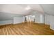 Spacious living room featuring hardwood floors and neutral paint at 1596 Willowbrook Sw Dr, Atlanta, GA 30311