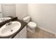 Clean bathroom with tile floor, vanity and toilet at 501 Fable Ln, Canton, GA 30114