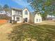 Inviting two-story home with manicured lawn and charming front facade at 501 Fable Ln, Canton, GA 30114
