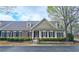 Charming home featuring a well-manicured yard with beautiful stone landscaping and classic architectural details at 625 Aunt Lucy Ln # 45, Smyrna, GA 30082