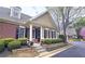 Inviting home featuring manicured landscaping, a cozy porch, and classic architectural details at 625 Aunt Lucy Ln # 45, Smyrna, GA 30082