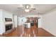 Open living room and kitchen area with hardwood floors and ample natural light from bright windows at 625 Aunt Lucy Ln # 45, Smyrna, GA 30082