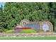 Community signage in front of beautiful landscaping at 625 Aunt Lucy Ln # 45, Smyrna, GA 30082