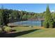 Community tennis courts surrounded by green trees at 625 Aunt Lucy Ln # 45, Smyrna, GA 30082