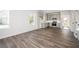 Spacious area featuring new vinyl floors, gray cabinets and stainless-steel appliances at 1005 Sims Nw Ave, Atlanta, GA 30318