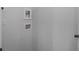 Laundry room area with washer/dryer hookups and access door at 1005 Sims Nw Ave, Atlanta, GA 30318