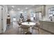 An open floorplan connects a cozy living room to a dining area and a modern kitchen at 1005 Sims Nw Ave, Atlanta, GA 30318