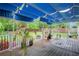 Spacious back deck with wooden floors and a patio cover perfect for relaxing and entertaining at 1315 Bustling Sw Ln, Marietta, GA 30064
