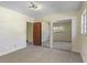 View of bedroom with large closet and mirror at 1470 Biltmore Ne Dr, Atlanta, GA 30329